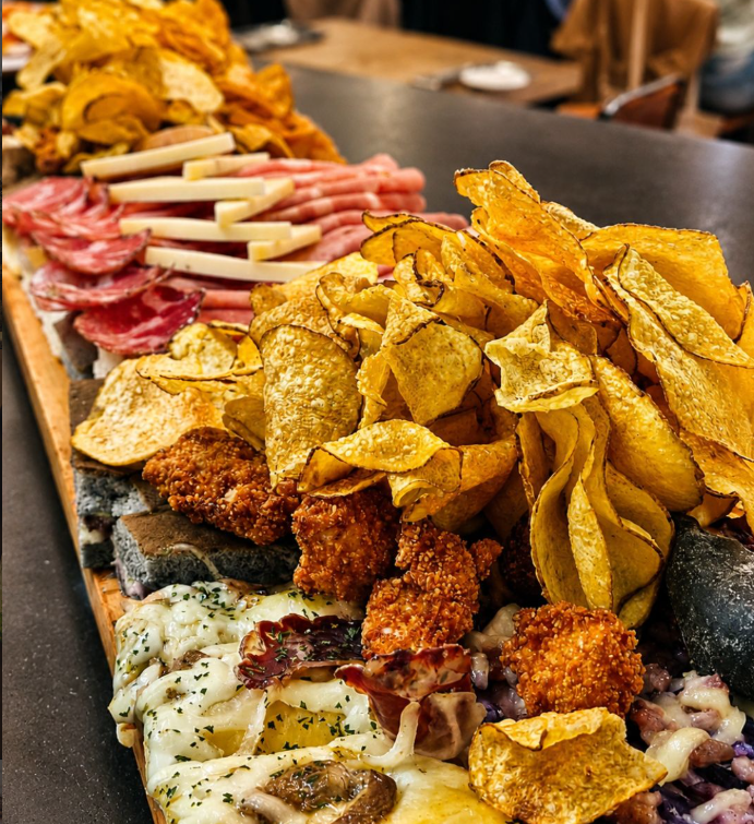 Aperitivo con lievitati da Locanda Manduca